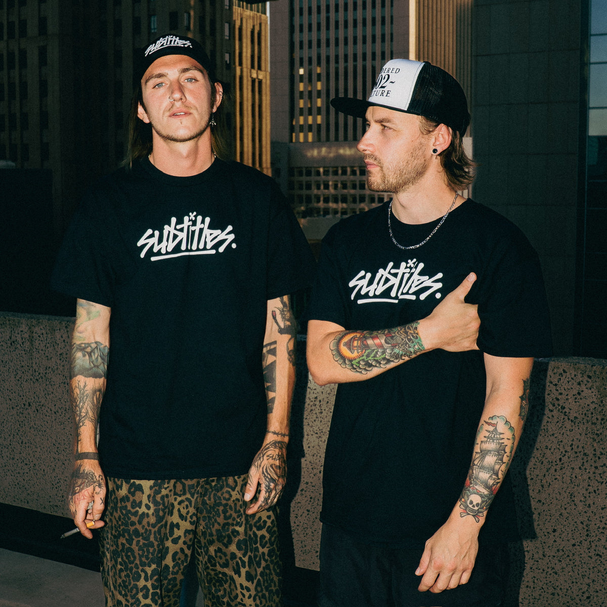 subtitles. Tour Tee