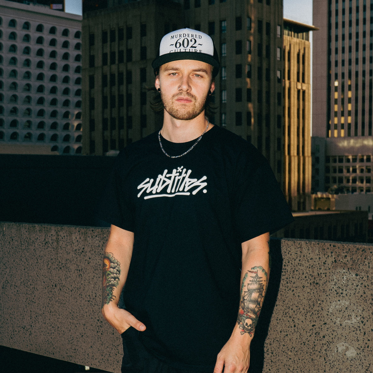 subtitles. Tour Tee
